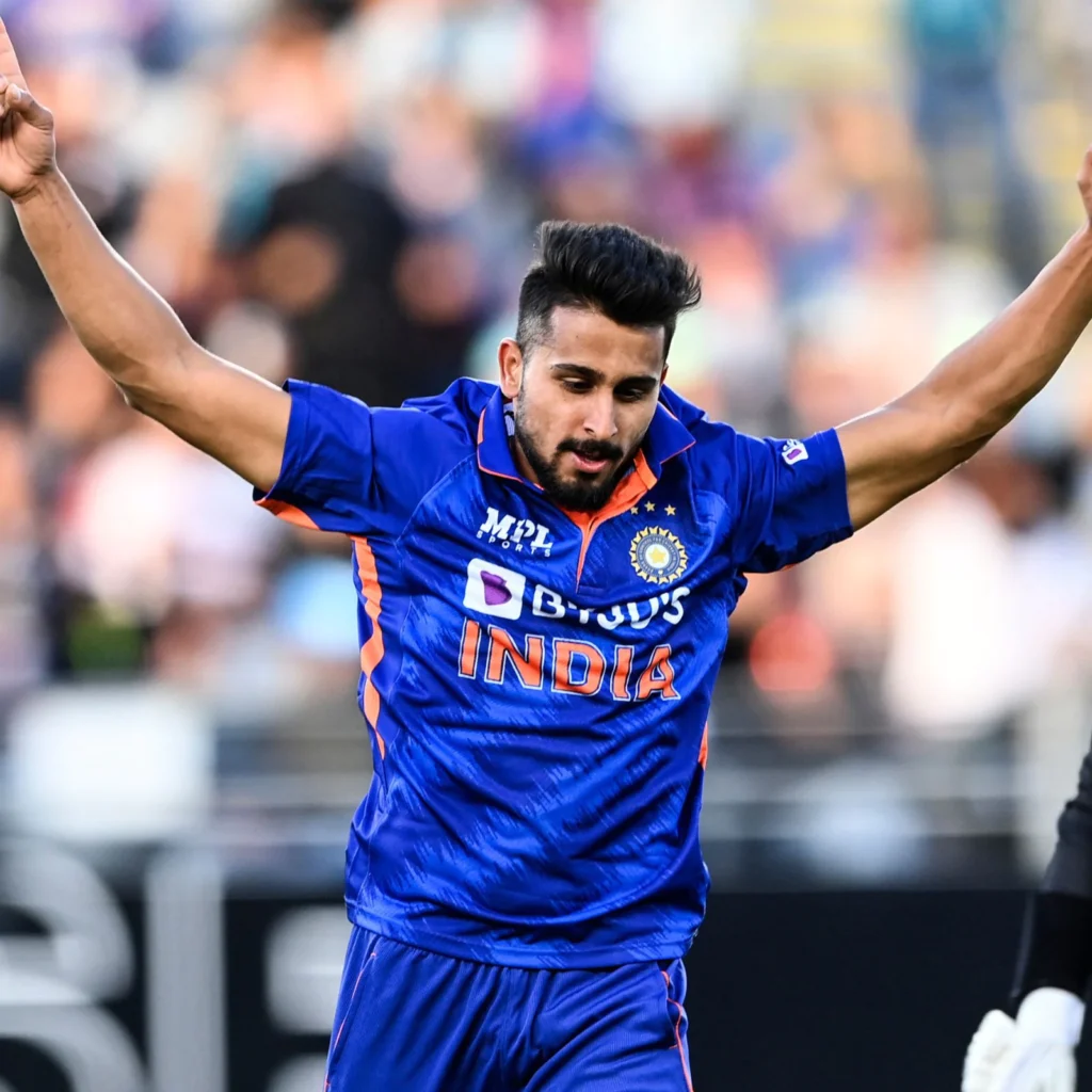 umran malik celebrates taking the wicket of new zealands devon conway ap photo