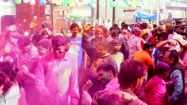 Dewas Holi: माता चामुंडा और माता तुलजा भवानी के द्वार पहुंचे श्रद्धालु ,फूलों और सूखे रंगों से मनाया होली पर्व 1 depositphotos_242559628-stock-video-barsana-india-201802242-holi-festival